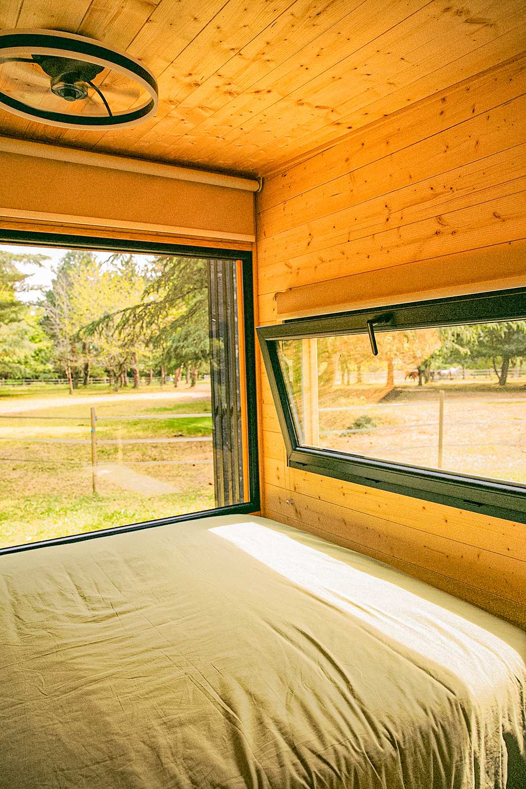 Le lit avec vue panoramique sur le parc